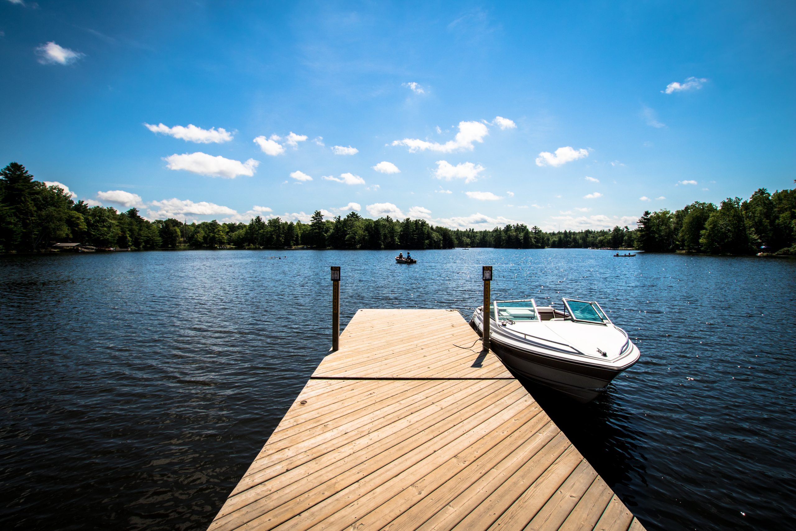 Fixed Lake Dock with Boat